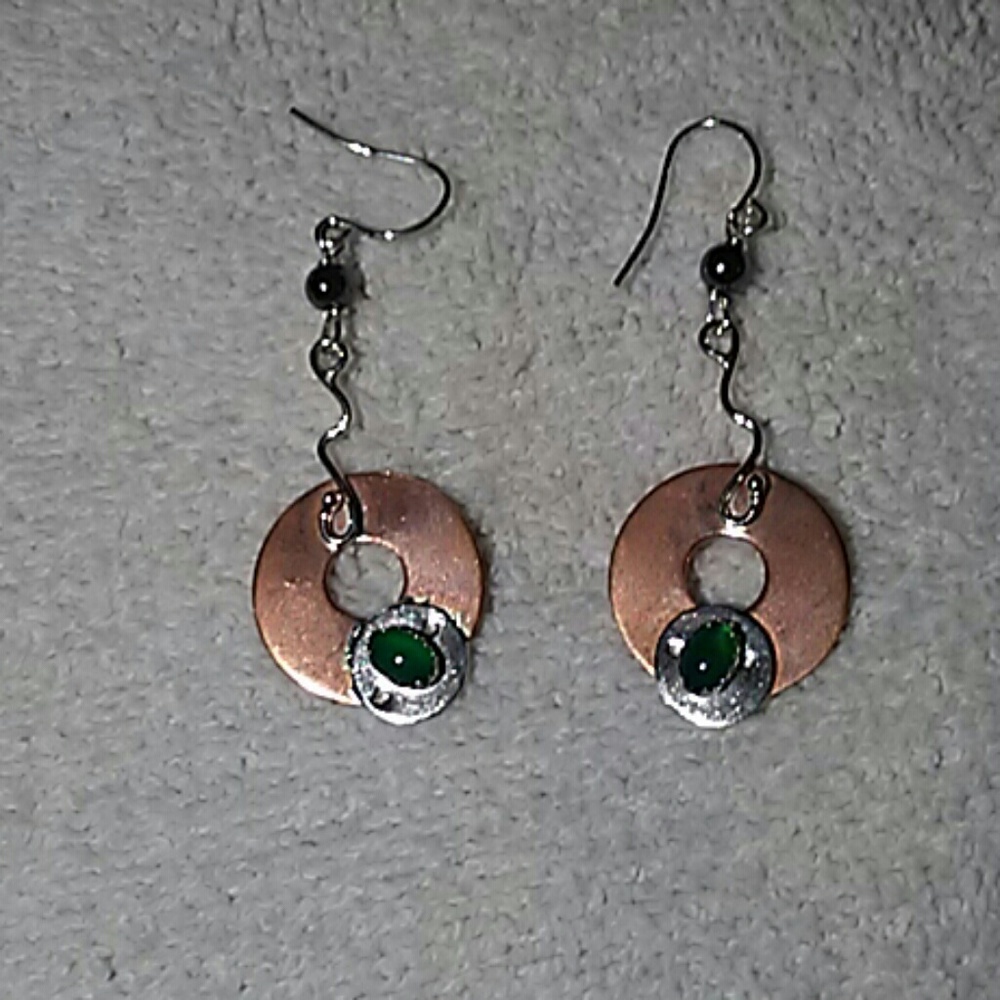 Pair dangle earrings by Bertha Quevedo.